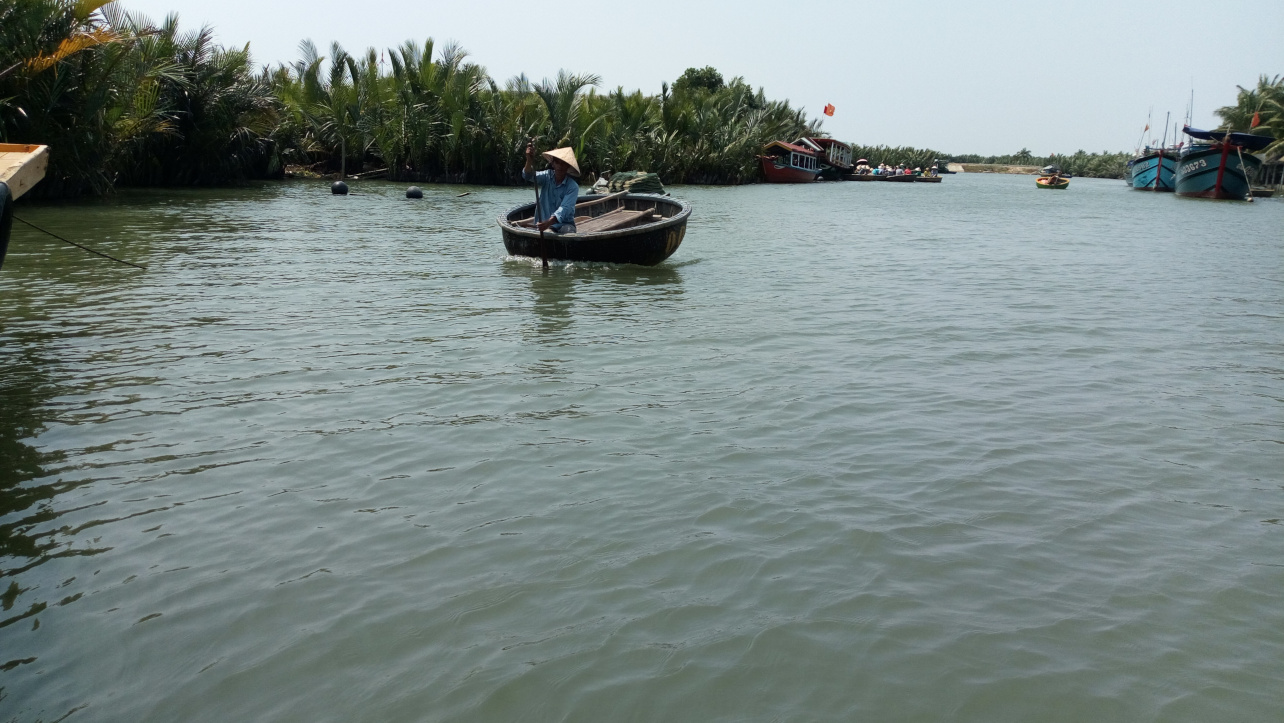 Single man are paddling coconut boat alone